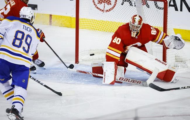 Flames suffer first loss of season as Tuch's hat trick leads Sabres to 6-3 win | iNFOnews.ca