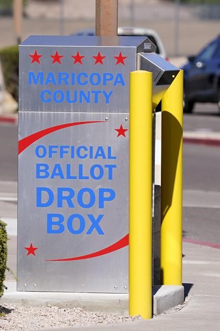 Feds concerned about armed people at Arizona ballot boxes | iNFOnews.ca