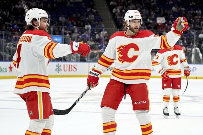 Dobson scores in OT to rally Islanders past Flames 4-3 | iNFOnews.ca