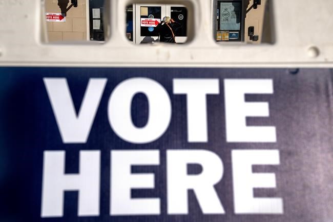 AP Photos: America votes in laundromats, schools, libraries | iNFOnews.ca CP449938086