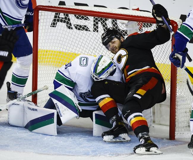 Kuzmenko, Martin lead Canucks to 4-3 shootout win over Flames | iNFOnews.ca CP1534719672
