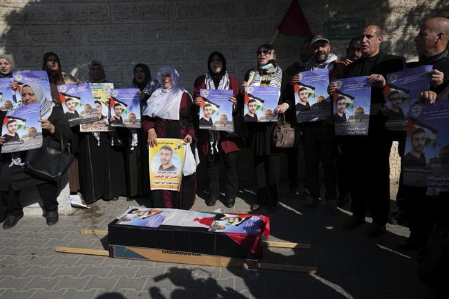 Palestinians march, shops close as prisoner dies in Israel | iNFOnews.ca