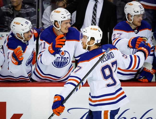 Oilers cash in on late power play to burn Flames 2-1 | iNFOnews.ca Oilers cash in on late power play to burn Flames 2-1 | iNFOnews.ca