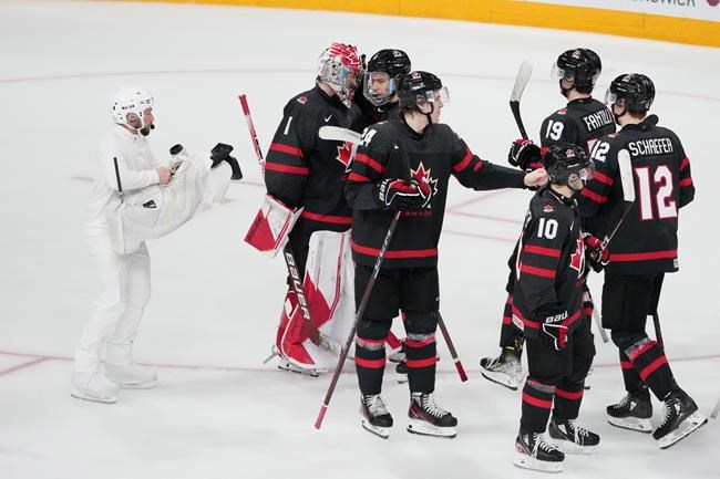 Camouflaged cameraman a hit at world juniors: 'I have the best seat in the house' | iNFOnews.ca Camouflaged cameraman a hit at world juniors: 'I have the best seat in the house' | iNFOnews.ca