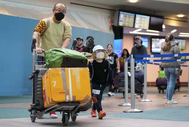 Travellers at YVR feel lucky after flight out of Hong Kong before COVID test rules | iNFOnews.ca