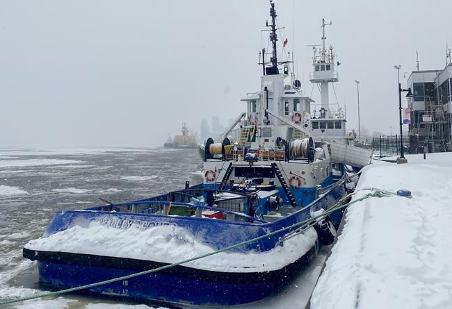 Advocates come together to help sailors stuck for months on tugboats in Quebec port | iNFOnews.ca CP304927785