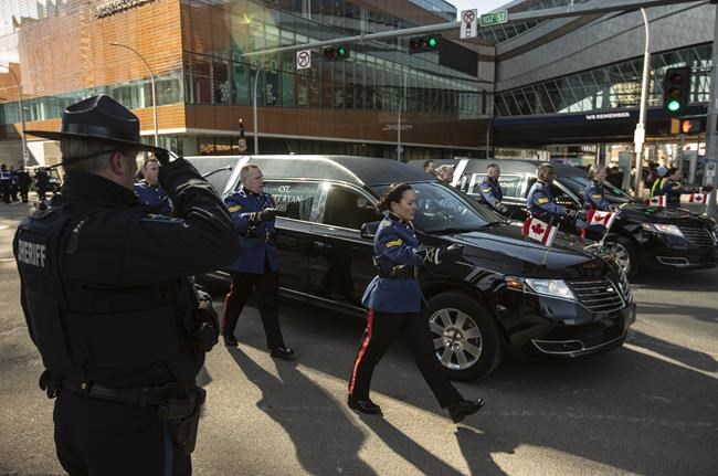 'Always remember': Funeral held for 2 Edmonton police officers killed on duty | iNFOnews.ca
