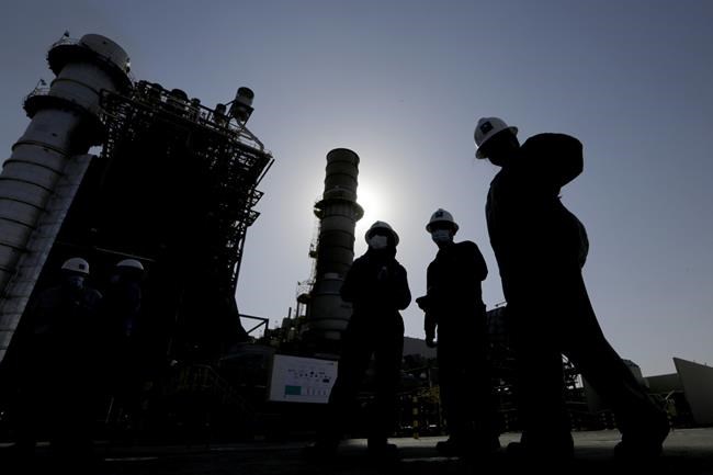 More oil producers join Saudis in surprise production cuts | iNFOnews.ca