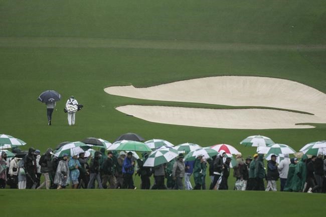 Rain halts Masters play yet again, making Sunday a long day | iNFOnews.ca