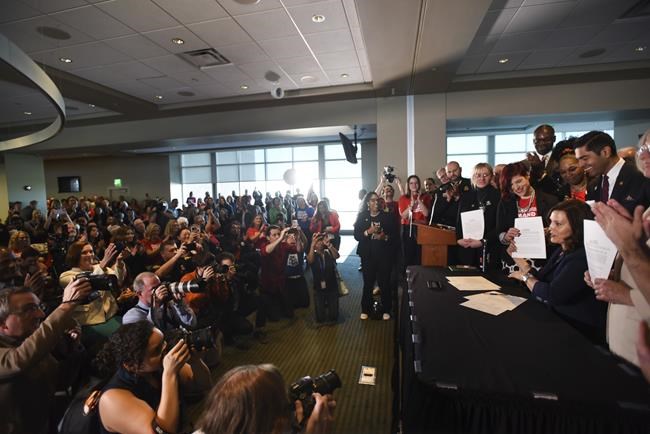 Whitmer signs stricter gun background check, storage bills | iNFOnews.ca