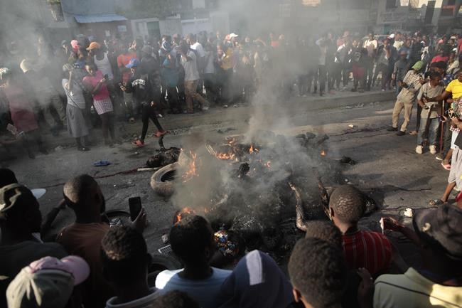 Mob kills 13 suspected Haiti gangsters with gas-soaked tires | iNFOnews.ca