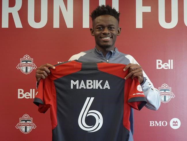 Newly acquired Toronto FC centre back Aime Mabika hard to miss at six foot six | iNFOnews.ca Newly acquired Toronto FC centre back Aime Mabika hard to miss at six foot six | iNFOnews.ca