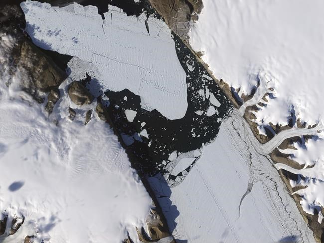 Warming-stoked tides eating huge holes in Greenland glacier | iNFOnews.ca