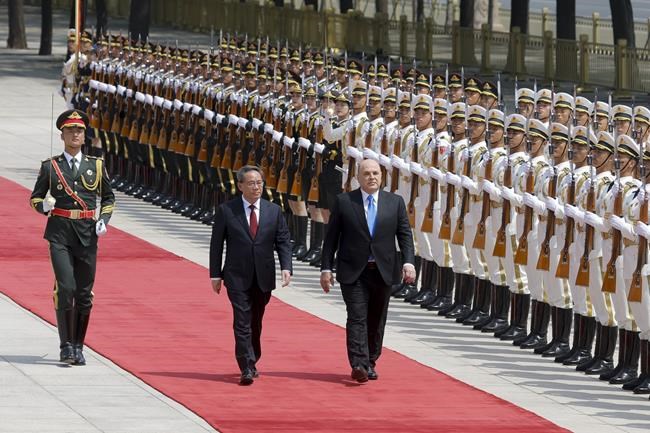 On Beijing visit, Russian prime minister says pressure from West is strengthening ties with China | iNFOnews.ca