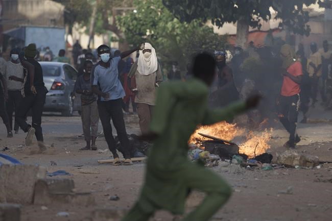 Death toll from Senegal protests rises to 15 as opposition supporters clash with police | iNFOnews.ca