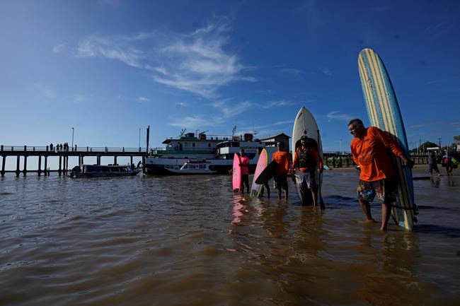 Surfers at Amazon's mouth ride some of world's longest-lasting waves | iNFOnews.ca