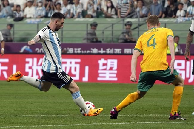Lionel Messi scores, gets hugged by a fan during Argentina's 2-0 win over Australia | iNFOnews.ca