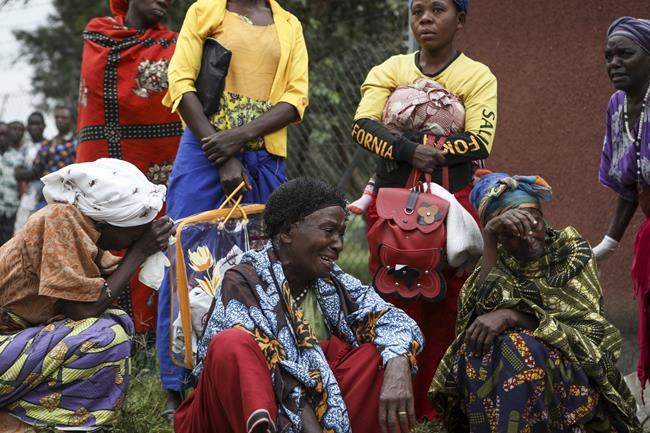 Ugandan border town buries victims of rebel massacre that left 42 dead, mostly students | iNFOnews.ca