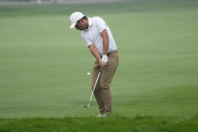 Taylor Moore, Peter Kuest lead Rocket Mortgage Classic; Dylan Wu 1 back after albatross | iNFOnews.ca