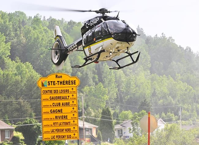 Search for two people missing after Quebec landslide a 'colossal' task: police | iNFOnews.ca