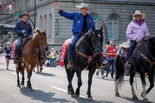 'Don't fall off the horse': Astronaut Jeremy Hansen leads Calgary Stampede parade | iNFOnews.ca