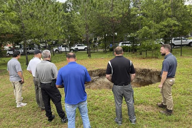 A Florida sinkhole that claimed a man's life in 2013 reopens, this time harmlessly | iNFOnews.ca