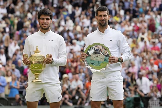 Carlos Alcaraz's Wimbledon trophy keeps him at No. 1. Marketa Vondrousova's lifts her to No. 10 | iNFOnews.ca