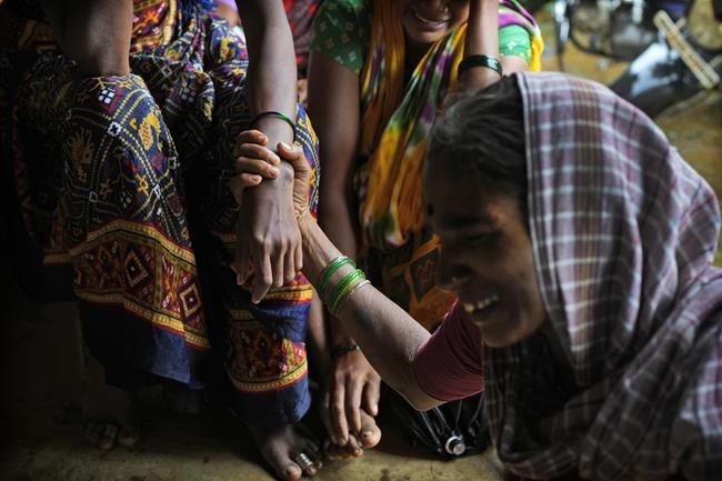 Indian rescuers recover 27 dead but no sign of dozens of missing villagers swamped by a landslide | iNFOnews.ca
