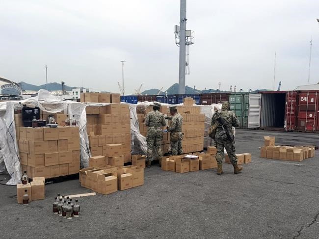 Mexican marines seize 7,200 bottles of liquid meth in mezcal bottles bound for Australia | iNFOnews.ca