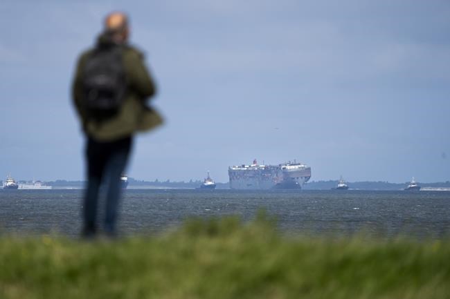 A car-carrying ship that burned for a week on the North Sea is towed to a Dutch port for salvaging | iNFOnews.ca A car-carrying ship that burned for a week on the North Sea is towed to a Dutch port for salvaging | iNFOnews.ca