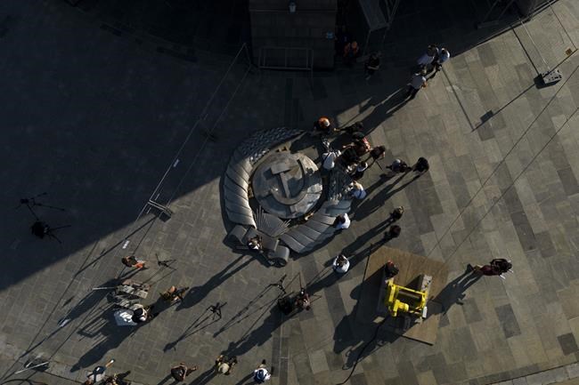 AP PHOTOS: Life in Kyiv may seem normal on the surface, but a closer look reveals the burdens of war | iNFOnews.ca