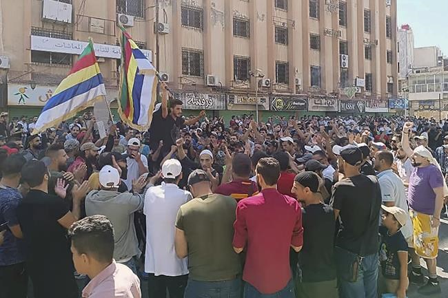 Residents in southern Syria raid ruling party offices, block road as protests over economy intensify | iNFOnews.ca Residents in southern Syria raid ruling party offices, block road as protests over economy intensify | iNFOnews.ca