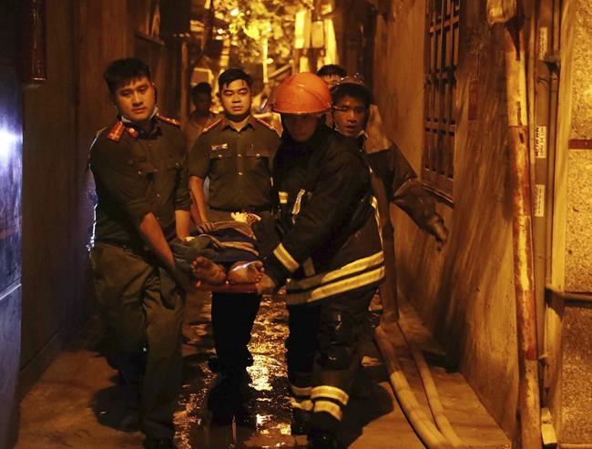 Fire in Vietnam's capital kills at least 56 when it engulfs an apartment building | iNFOnews.ca Fire in Vietnam's capital kills at least 56 when it engulfs an apartment building | iNFOnews.ca