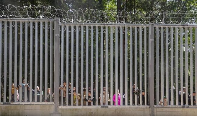 A cash-for visas scandal hits Poland's strongly anti-migration government, weeks before elections | iNFOnews.ca