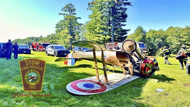 World War I-era plane flips onto roof trying to land near Massachusetts museum; pilot unhurt | iNFOnews.ca World War I-era plane flips onto roof trying to land near Massachusetts museum; pilot unhurt | iNFOnews.ca