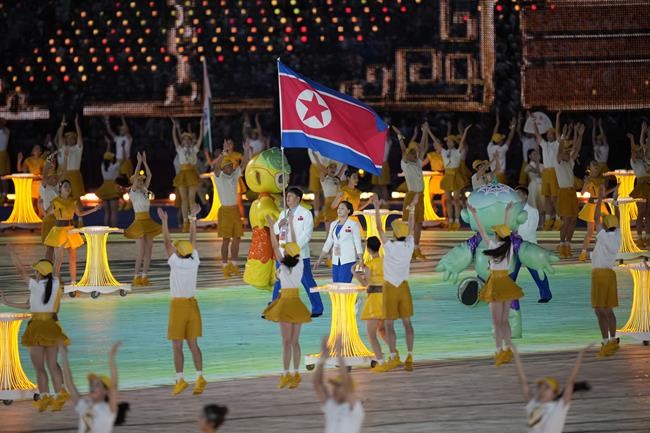 Lots of dignitaries but no real fireworks - only electronic flash - as the Asian Games open | iNFOnews.ca