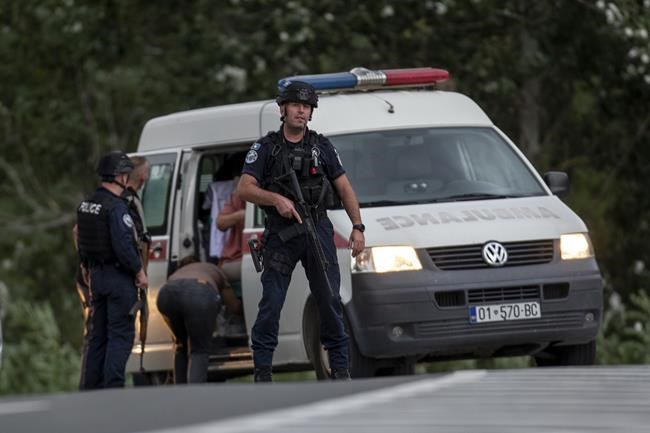 Kosovo mourns a slain police officer, some Serb gunmen remain at large after a siege at a monastery | iNFOnews.ca