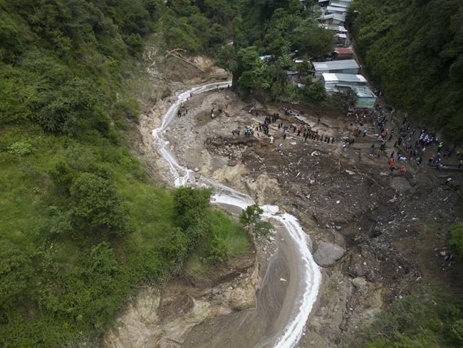 At least 6 people are dead and 12 missing after flash flood in Guatemala sweeps homes into river | iNFOnews.ca