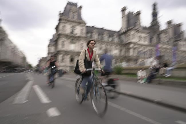 Long a city that embraced cars, Paris is seeing a new kind of road rage: Bike-lane traffic jams | iNFOnews.ca