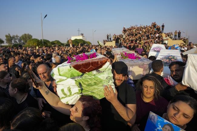Iraq's prime minister visits wedding fire victims as 2 more people die from their injuries | iNFOnews.ca