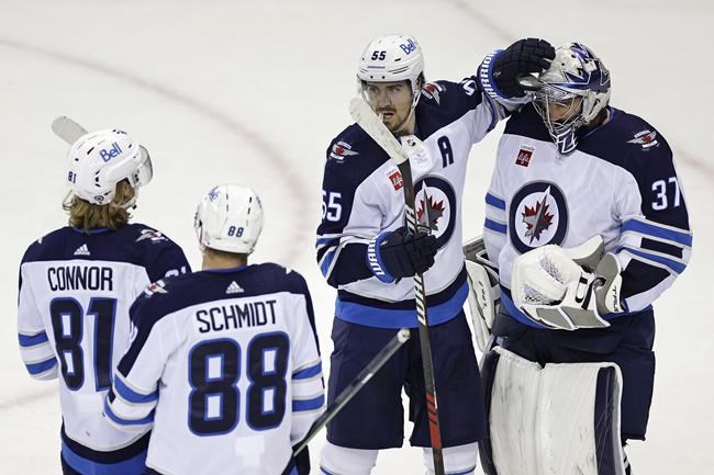 Scheifele, Hellebuyck sign identical, long-term extensions with Winnipeg Jets | iNFOnews.ca