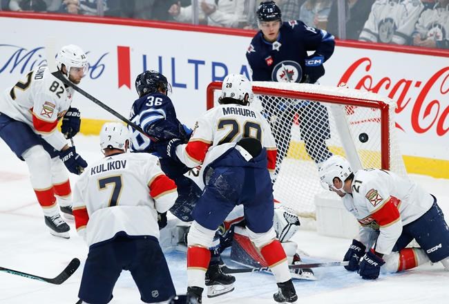 Connor scores twice, adds assist as Jets win home opener 6-4 over Panthers | iNFOnews.ca