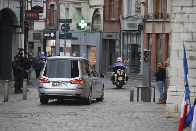 French presidential couple attend funeral service of teacher slain in school attack | iNFOnews.ca