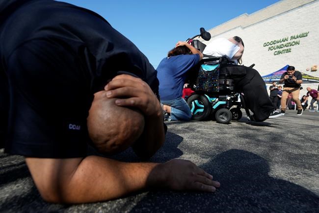 Residents of earthquake zones 'drop, cover and hold on' during annual ShakeOut quake drill | iNFOnews.ca