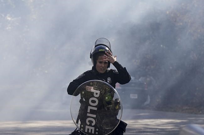 Police and protesters clash at Atlanta training center site derided by opponents as 'Cop City' | iNFOnews.ca