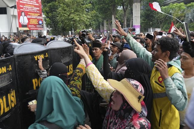 Conservative Muslims in Indonesia protest Coldplay concert over the band's LGBTQ+ support | iNFOnews.ca