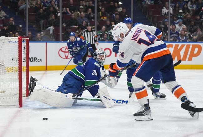 Quinn Hughes scores OT winner as Canucks claw out 4-3 win over Islanders | iNFOnews.ca Quinn Hughes scores OT winner as Canucks claw out 4-3 win over Islanders | iNFOnews.ca