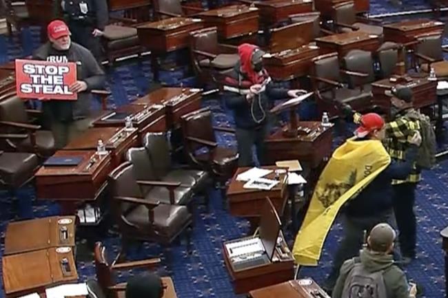 FBI: Man wearing Captain America backpack stole items from senators' desks during Capitol riot | iNFOnews.ca FBI: Man wearing Captain America backpack stole items from senators' desks during Capitol riot | iNFOnews.ca