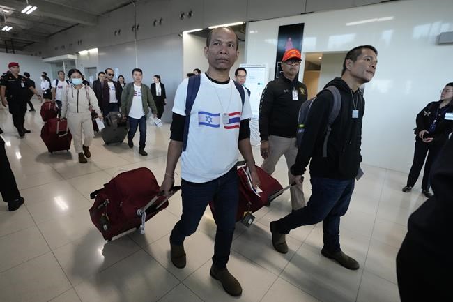 Families reunite with 17 Thai hostages freed by Hamas at homecoming at Bangkok airport | iNFOnews.ca