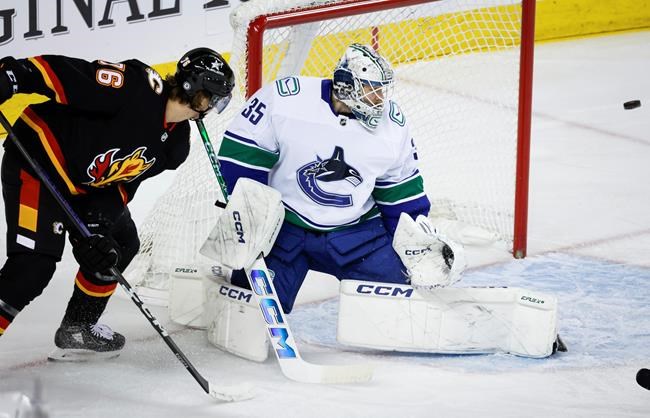 Visiting Canucks hang on to edge Flames 4-3 | iNFOnews.ca